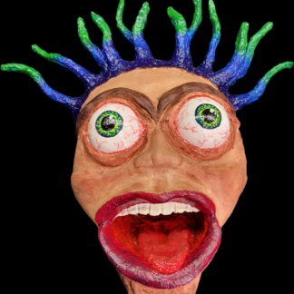 Decorative wall art mask. Bug eyed, hair standing on end with the mouth wide open in a scream.